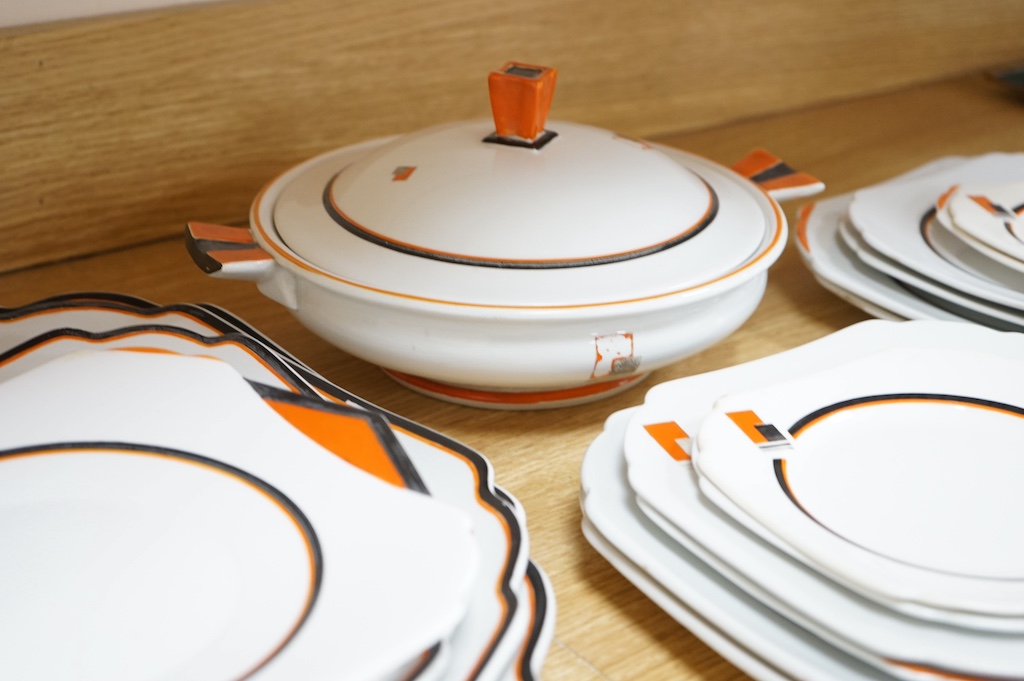 A Shelley ‘Vogue’ orange comprehensive dinner service. Largest platter 44cm wide. Condition - some enamelling worn or missing